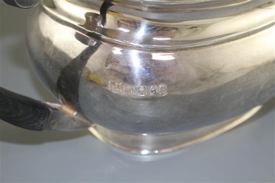 A modern silver teapot, Poston Products Ltd, Sheffield, 1977, gross weight, 25.5 oz.